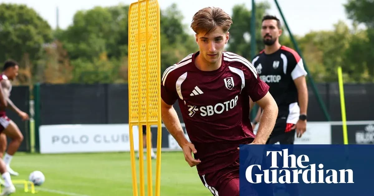 Player running during Fulham training session Player running during Fulham training session