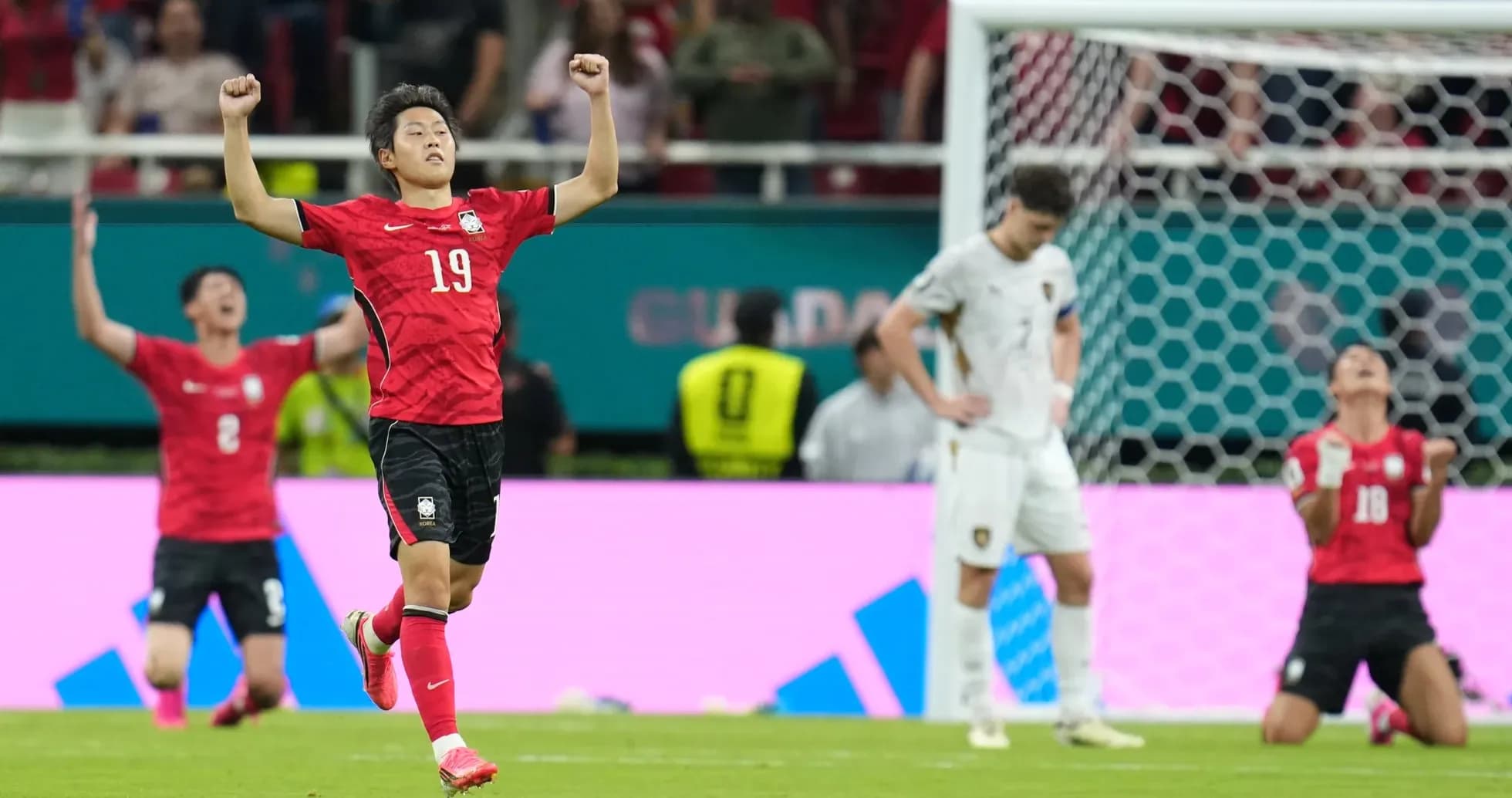 South Korea players celebrating a goal in match South Korea players celebrating a goal in match