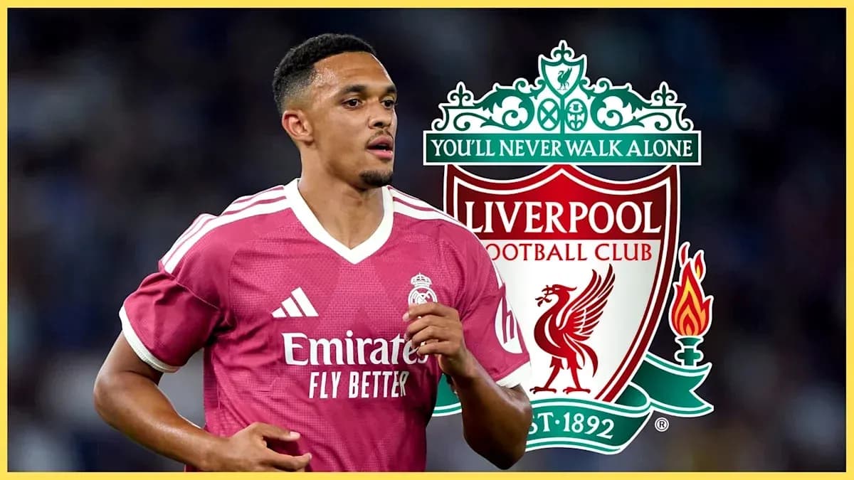Player in pink kit with Liverpool logo background Player in pink kit with Liverpool logo background