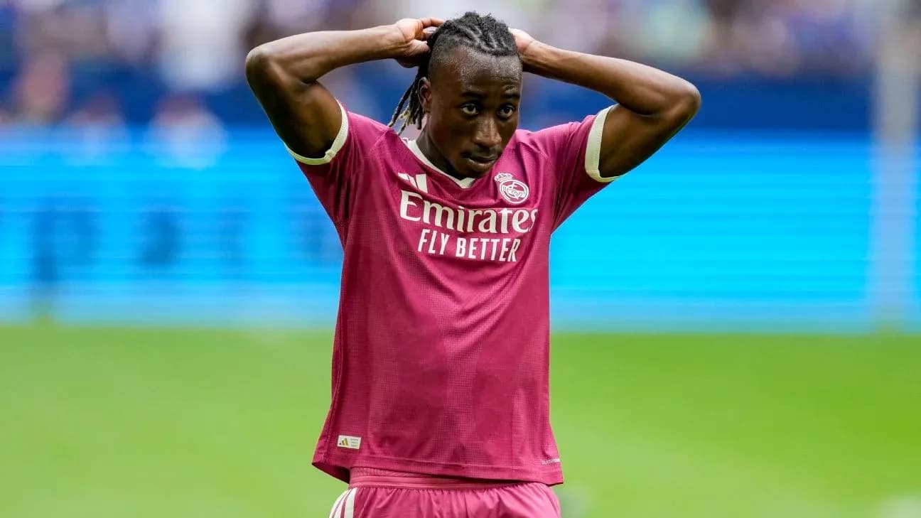 Player in pink jersey with hands on head during match Player in pink jersey with hands on head during match