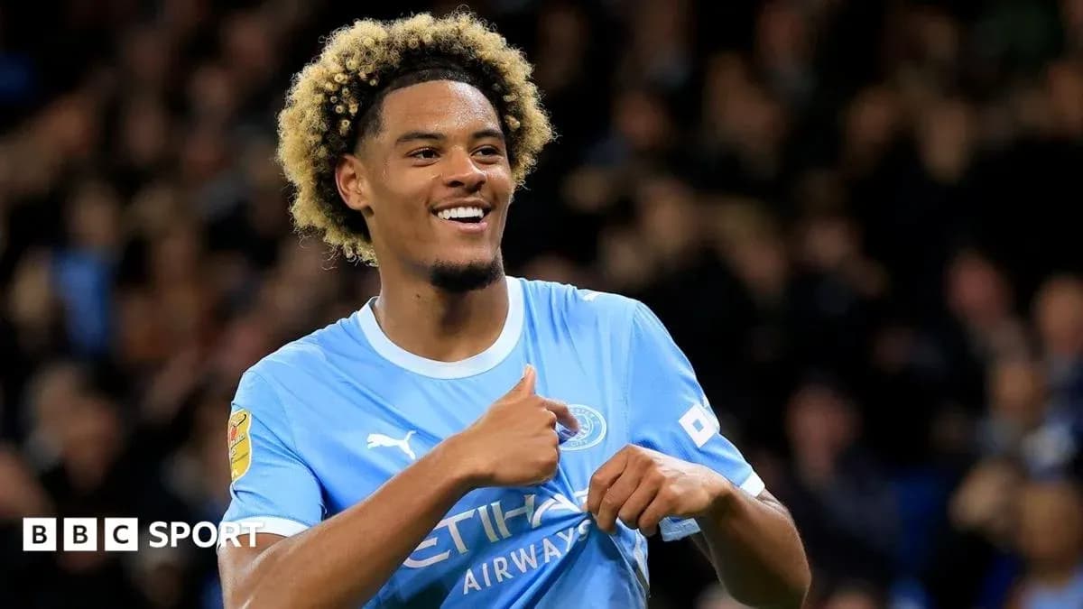 Player celebrating in Manchester City jersey Player celebrating in Manchester City jersey