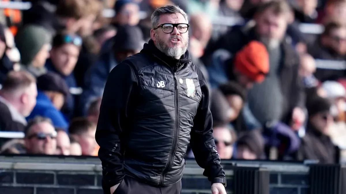 Coach on sideline during a football match Coach on sideline during a football match