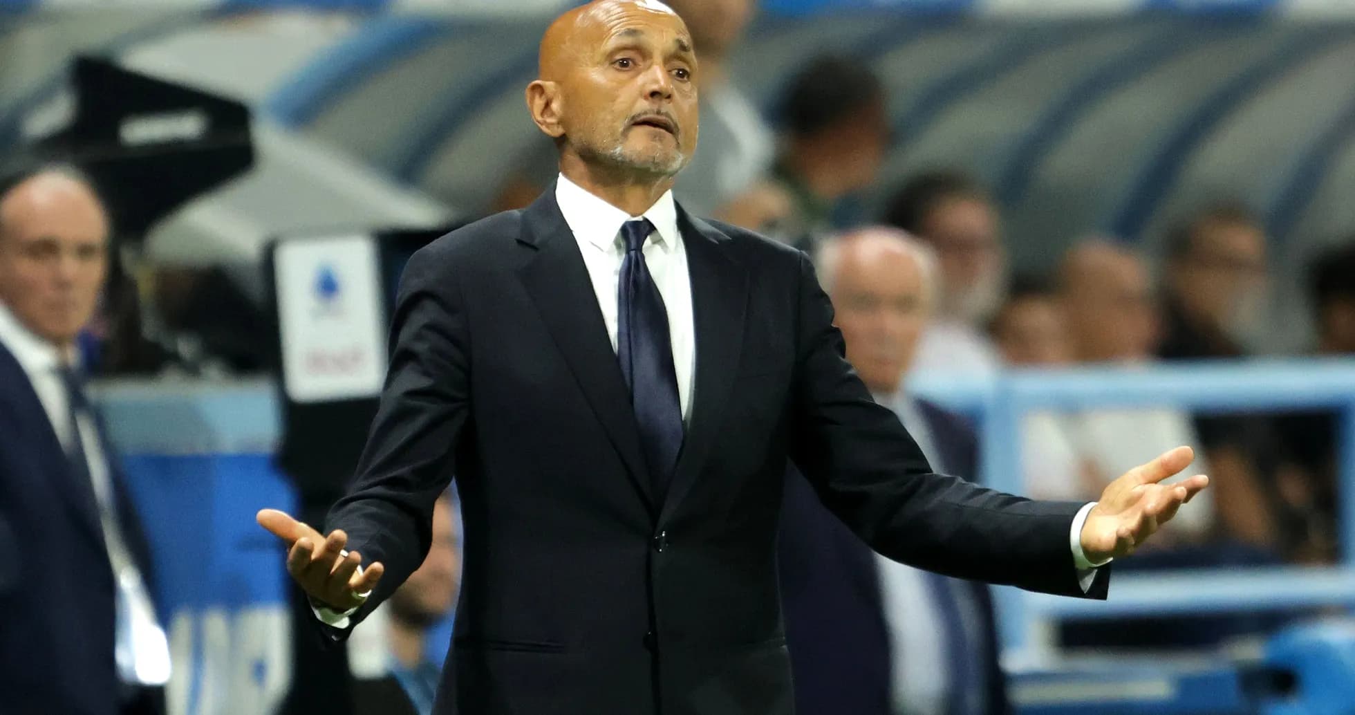 Coach gesturing during a match on the sidelines Coach gesturing during a match on the sidelines