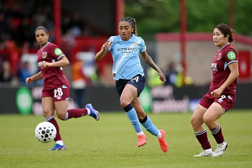 Player dribbling the ball during match action Player dribbling the ball during match action