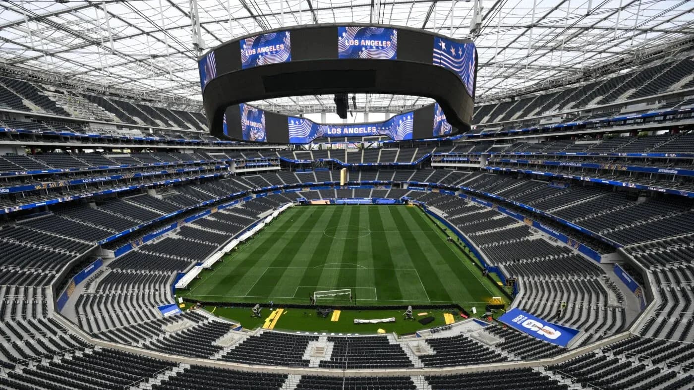Interior view of stadium with empty seating and field Interior view of stadium with empty seating and field
