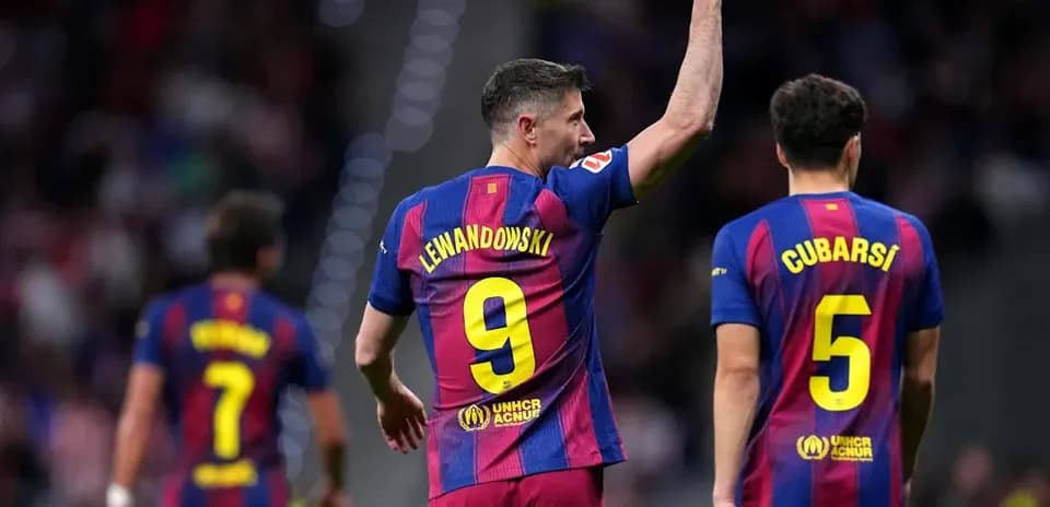 Robert Lewandowski celebrating with teammates during match Robert Lewandowski celebrating with teammates during match