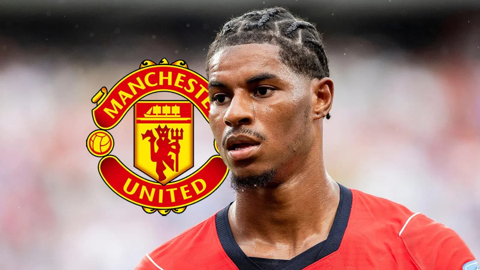 Player in red jersey with Manchester United logo Player in red jersey with Manchester United logo
