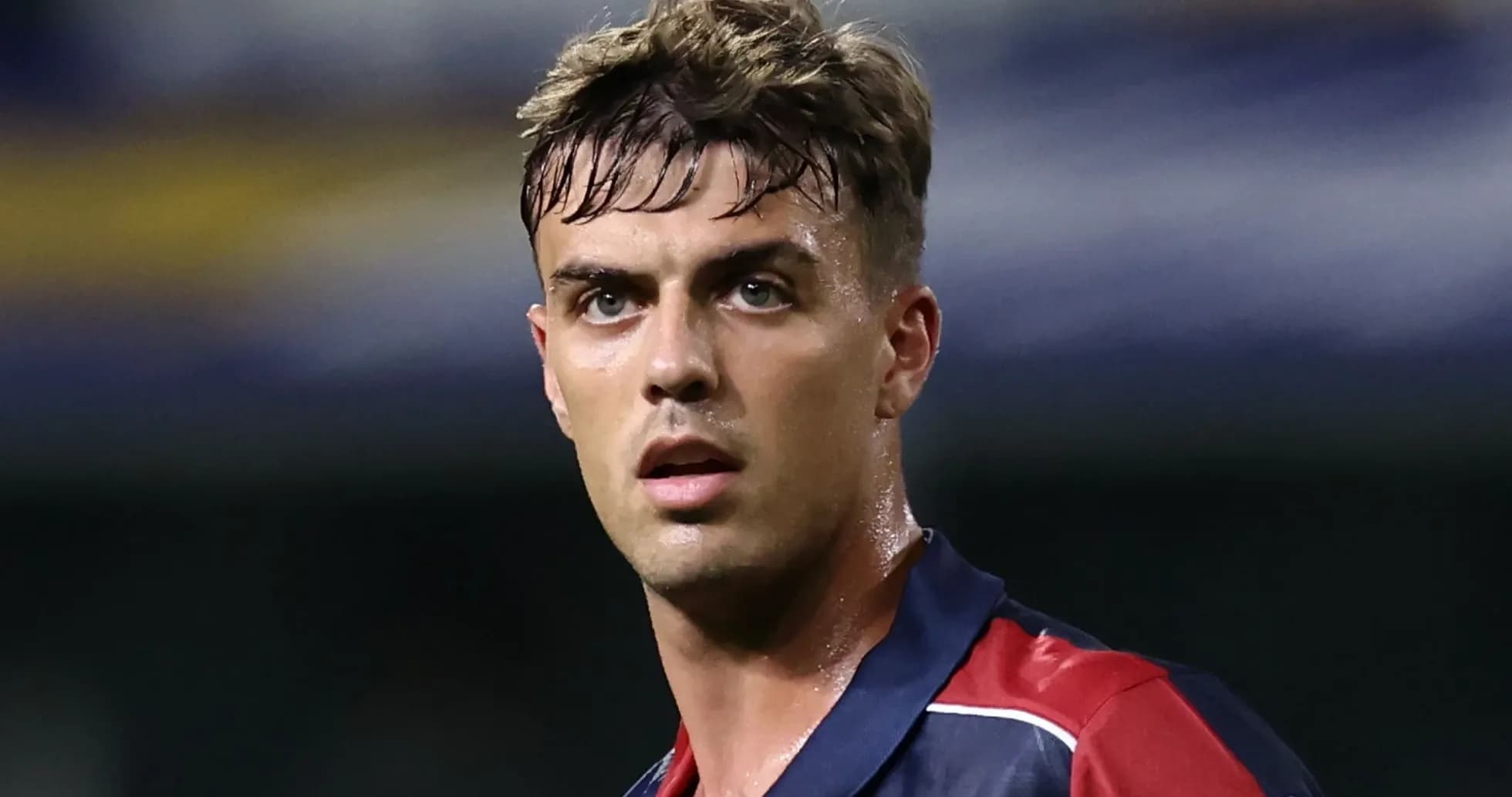 Player looking focused during a match Player looking focused during a match