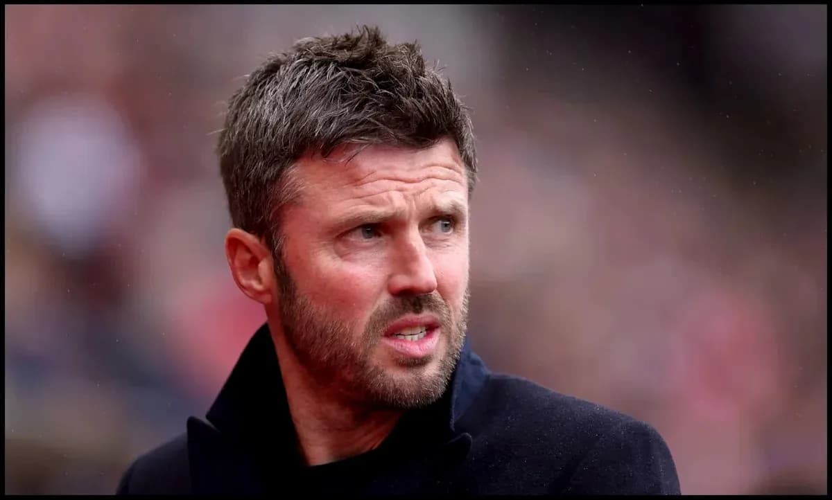 Man in black coat observing match from sidelines Man in black coat observing match from sidelines