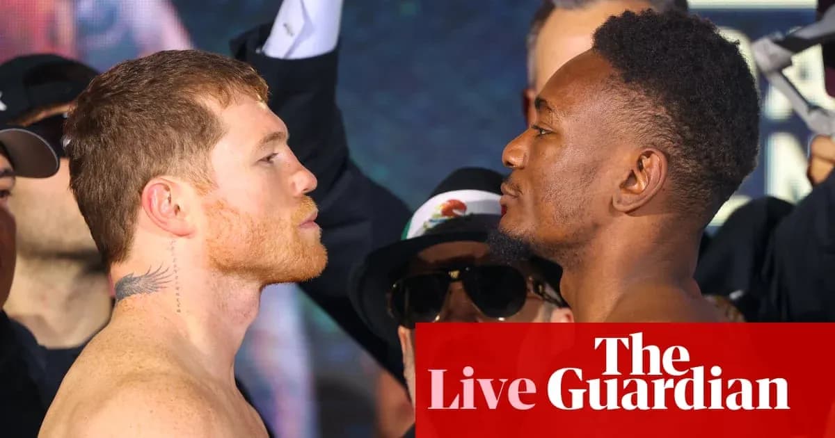 Two boxers facing off at weigh-in event Two boxers facing off at weigh-in event