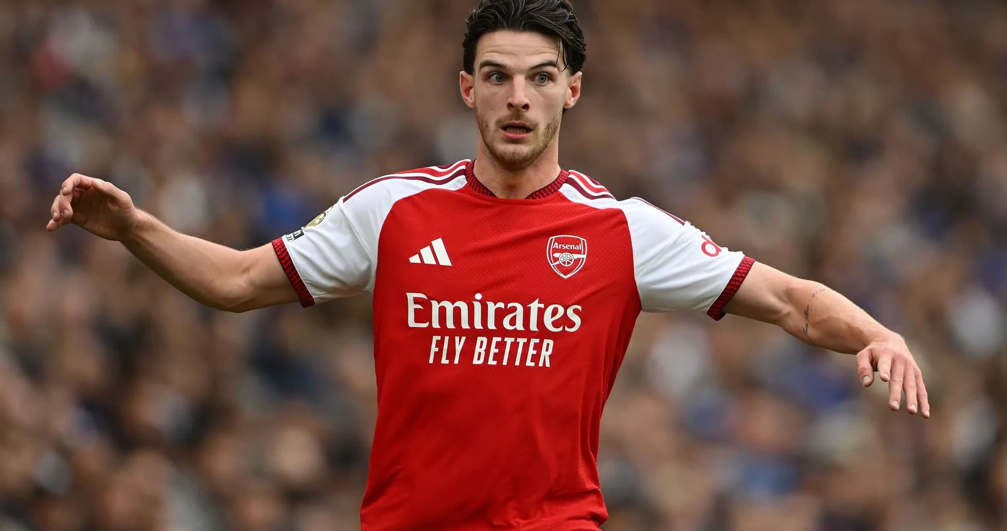 Arsenal player gesturing during a match Arsenal player gesturing during a match