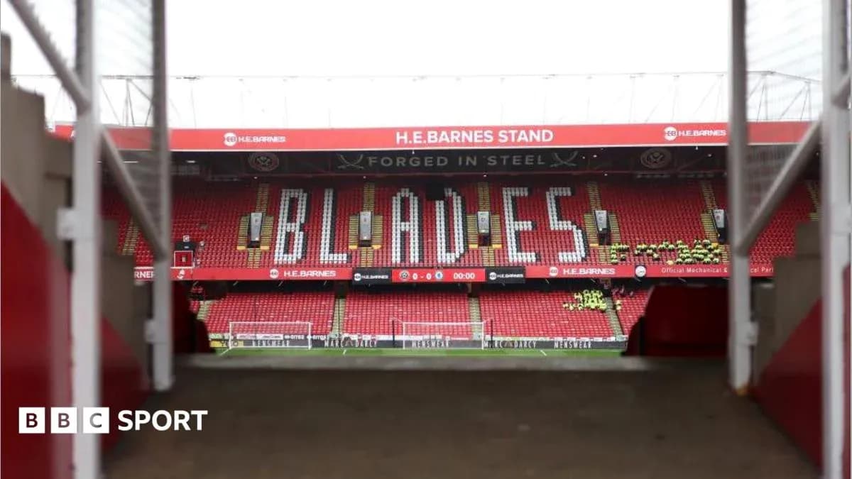 View of H.E. Barnes Stand with 'BLADES' sign View of H.E. Barnes Stand with 'BLADES' sign