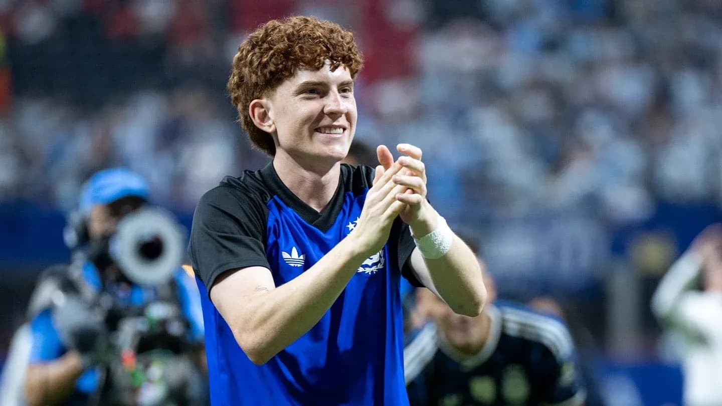 Player celebrating and applauding fans after match Player celebrating and applauding fans after match