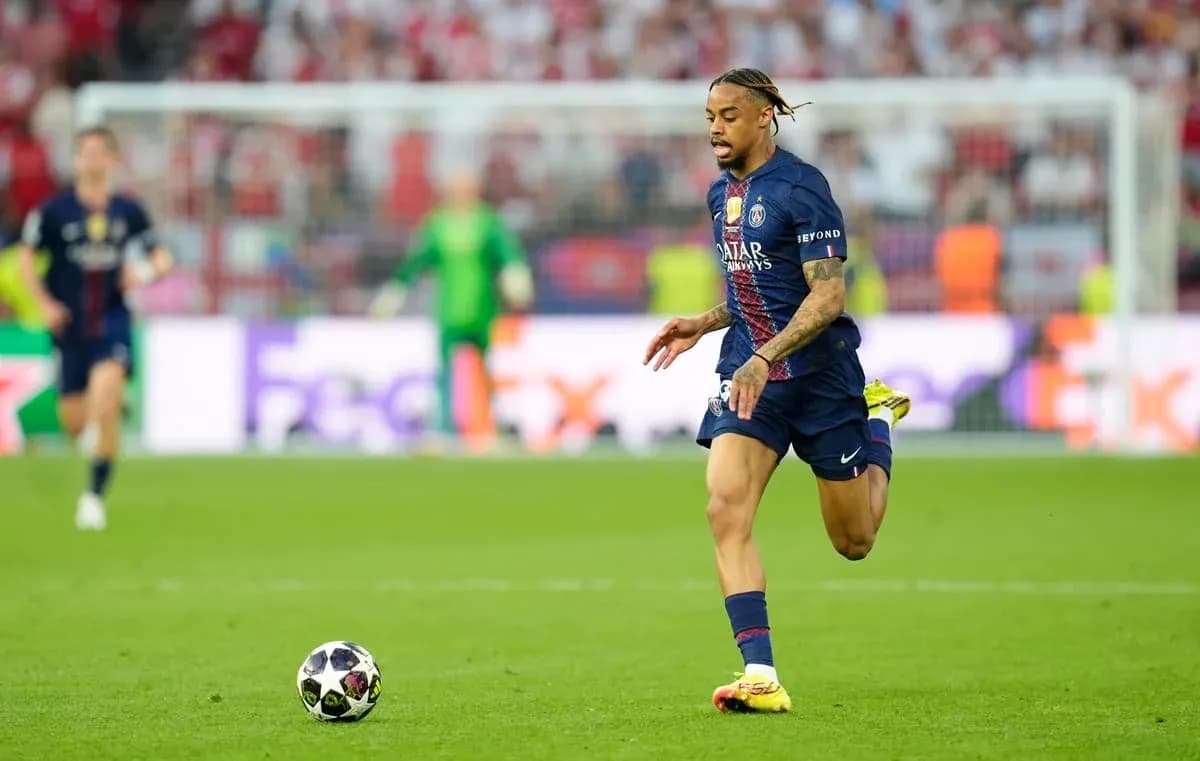 PSG player running with ball during match PSG player running with ball during match