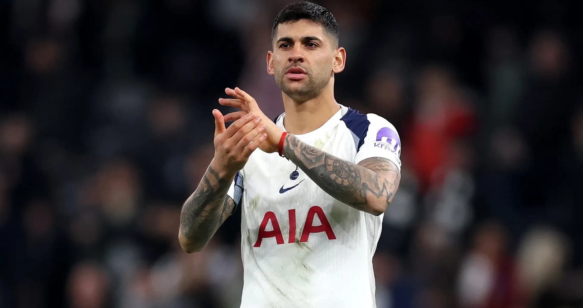 Player applauding fans after a match Player applauding fans after a match