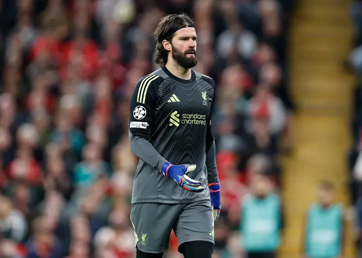 Goalkeeper walking on pitch during match Goalkeeper walking on pitch during match