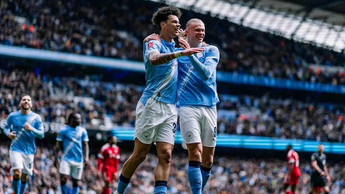 Manchester City players celebrating a goal together Manchester City players celebrating a goal together