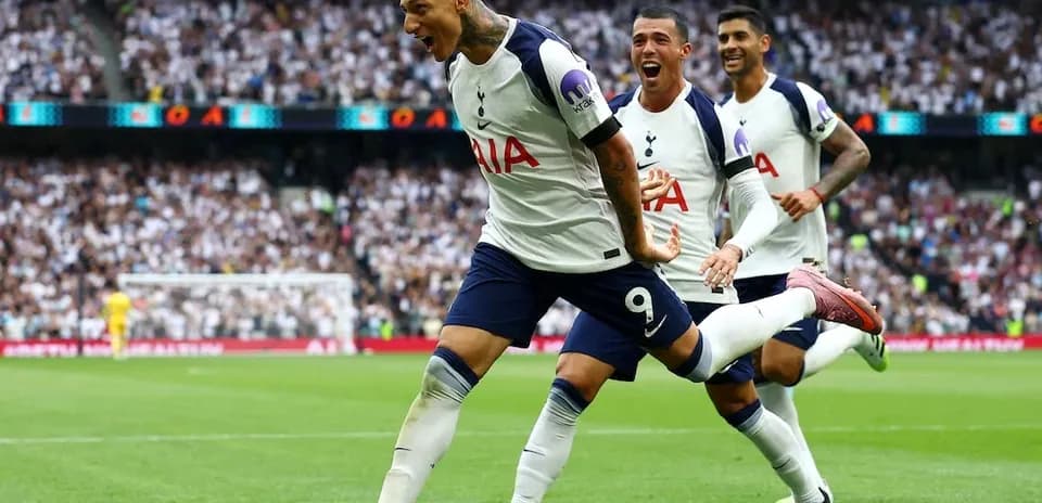 Tottenham players celebrating a goal during match Tottenham players celebrating a goal during match