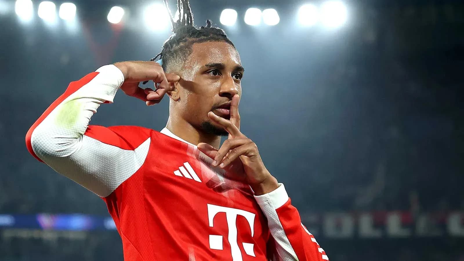 Player celebrating goal with shushing gesture Player celebrating goal with shushing gesture