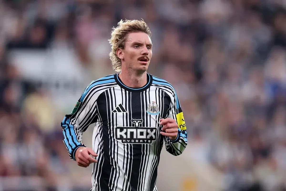 Newcastle player running on the field during match Newcastle player running on the field during match