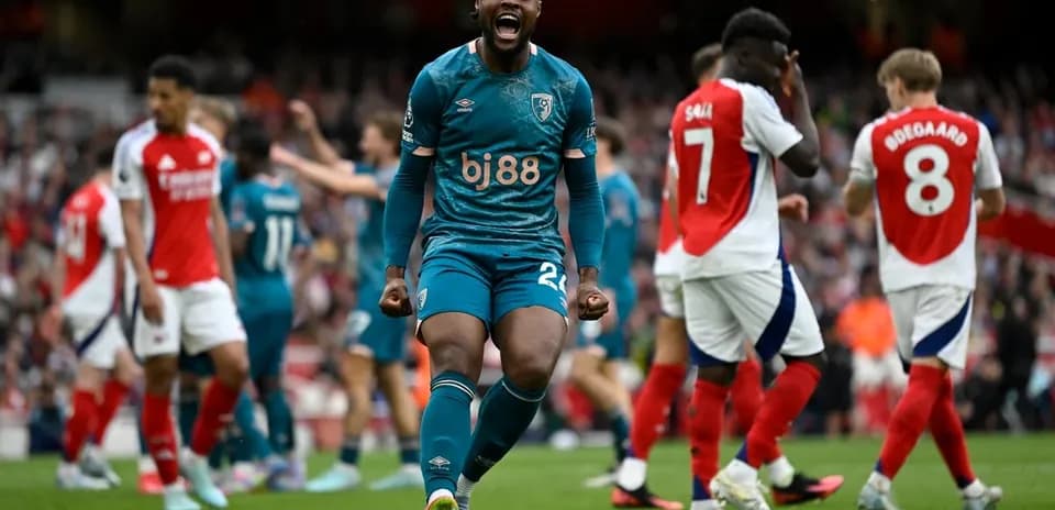 Bournemouth player celebrating a goal against Arsenal Bournemouth player celebrating a goal against Arsenal