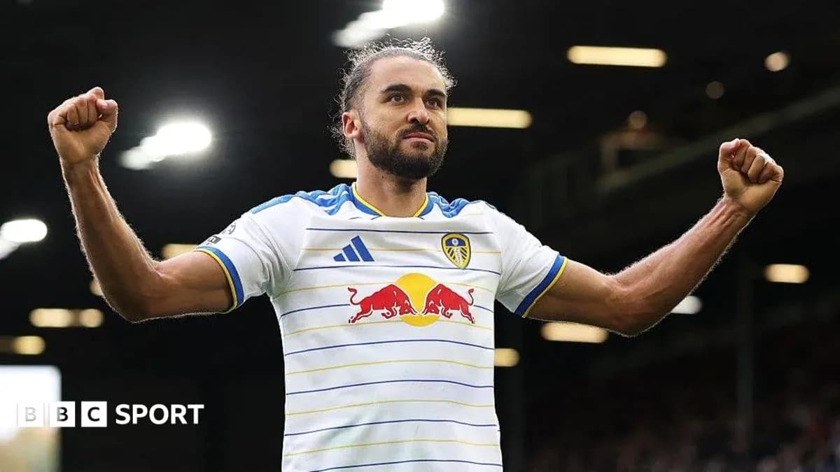 Player celebrating in Leeds United jersey at stadium Player celebrating in Leeds United jersey at stadium