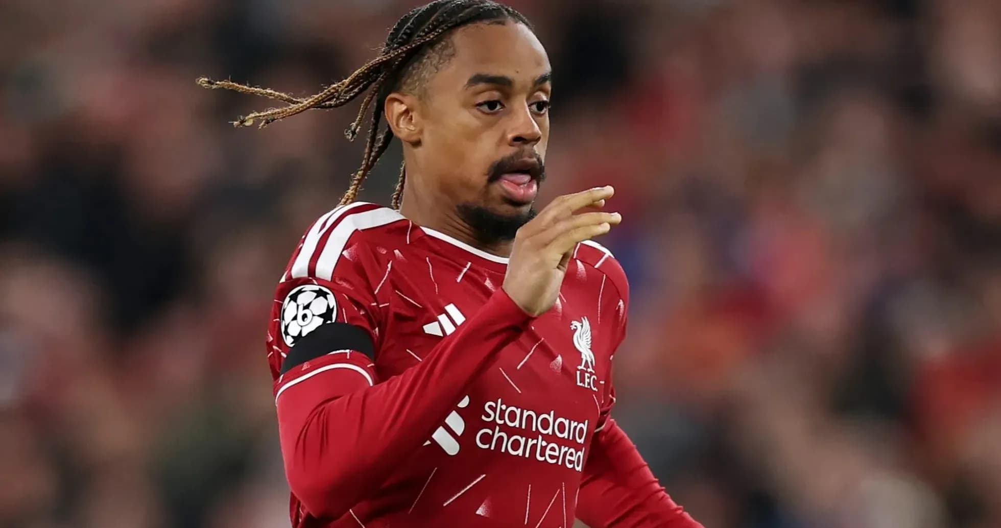 Player running during a UEFA Champions League match Player running during a UEFA Champions League match