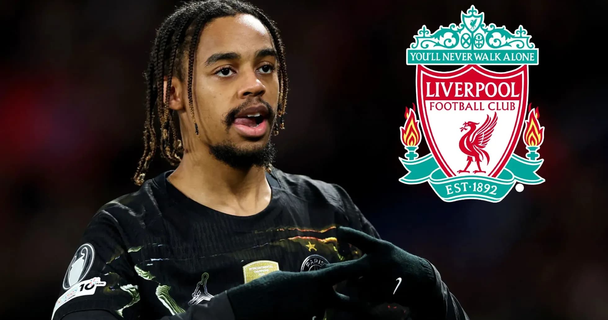Player gesturing during match with Liverpool logo Player gesturing during match with Liverpool logo