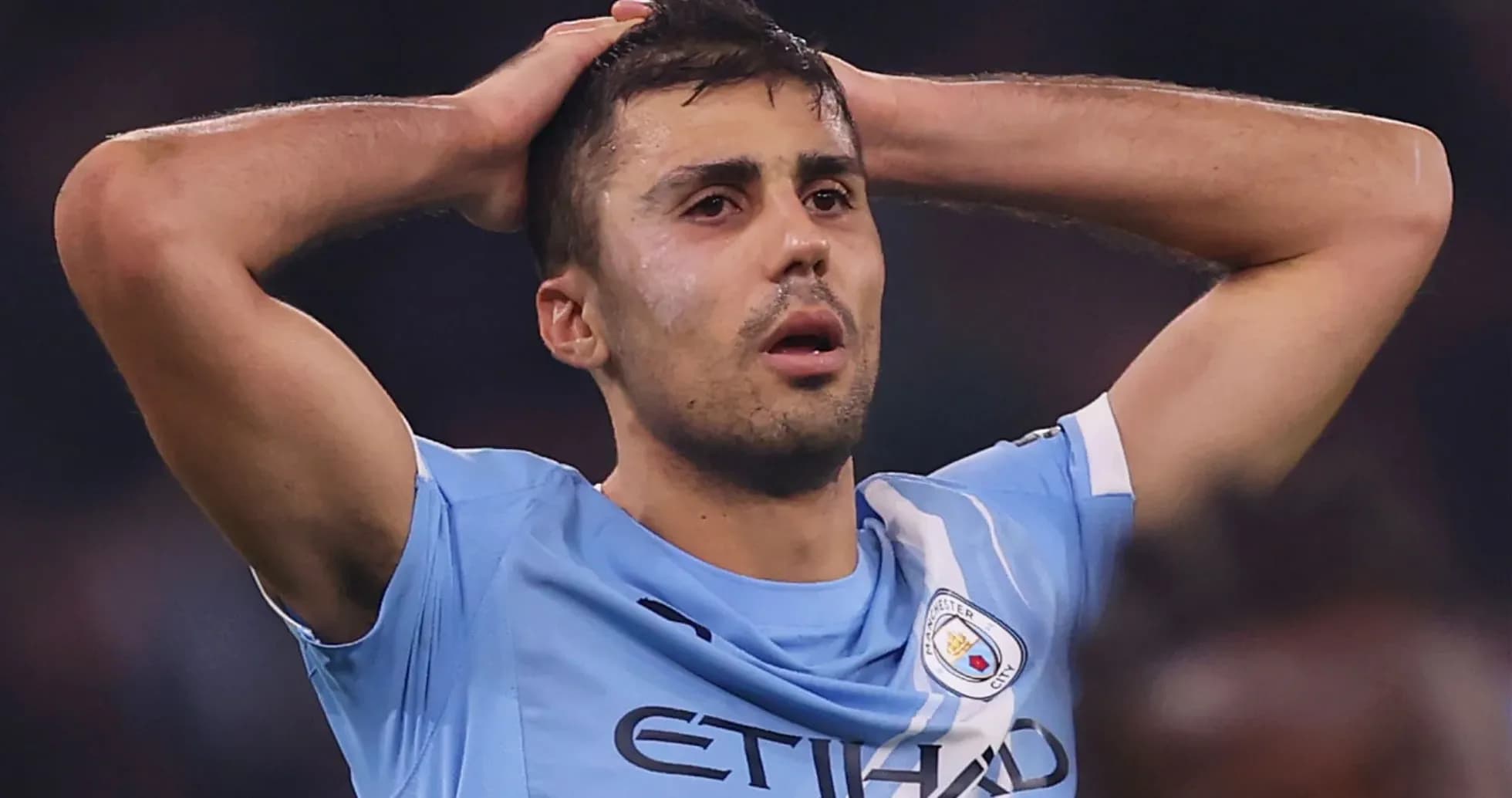 Player holding head in frustration during match Player holding head in frustration during match
