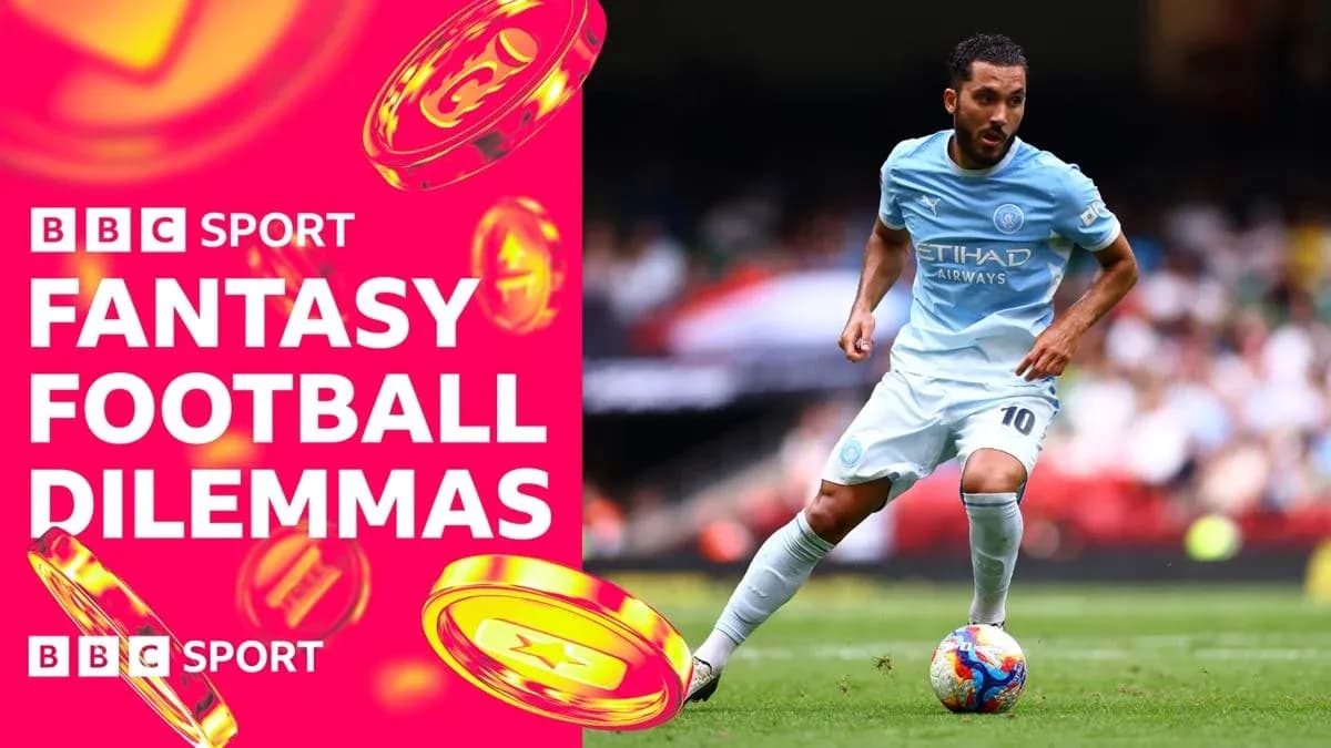 Player in light blue kit dribbling on football pitch Player in light blue kit dribbling on football pitch