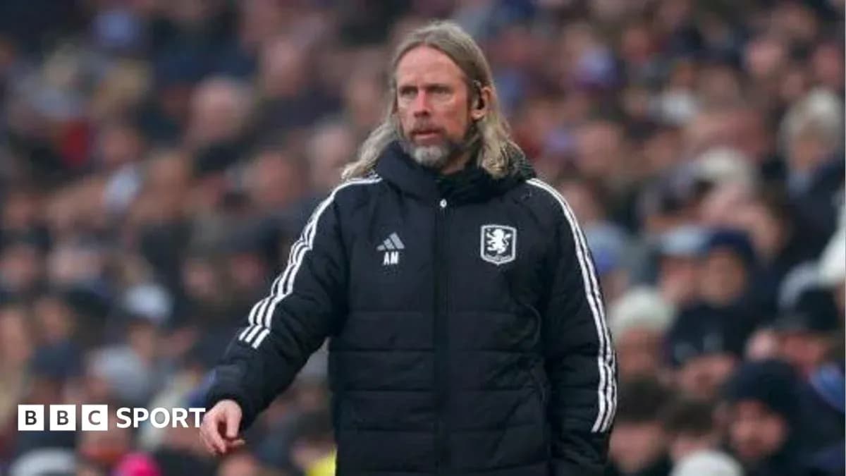 Manager on sideline during football match Manager on sideline during football match