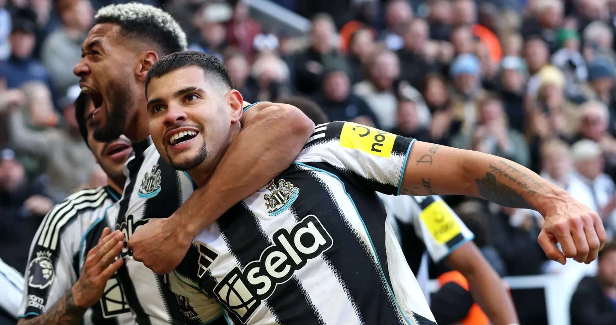 Newcastle players celebrating a goal during match Newcastle players celebrating a goal during match