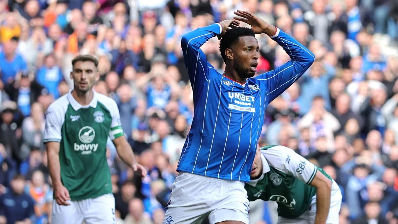 Player in blue celebrating a goal during match Player in blue celebrating a goal during match