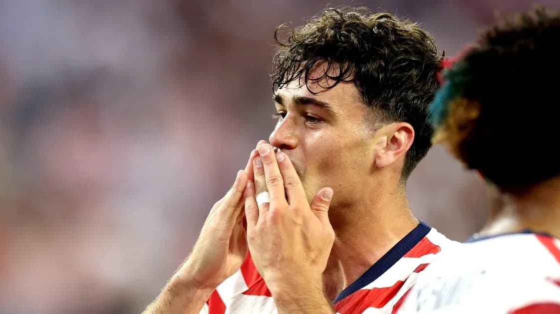 Player celebrating after scoring a goal in match Player celebrating after scoring a goal in match