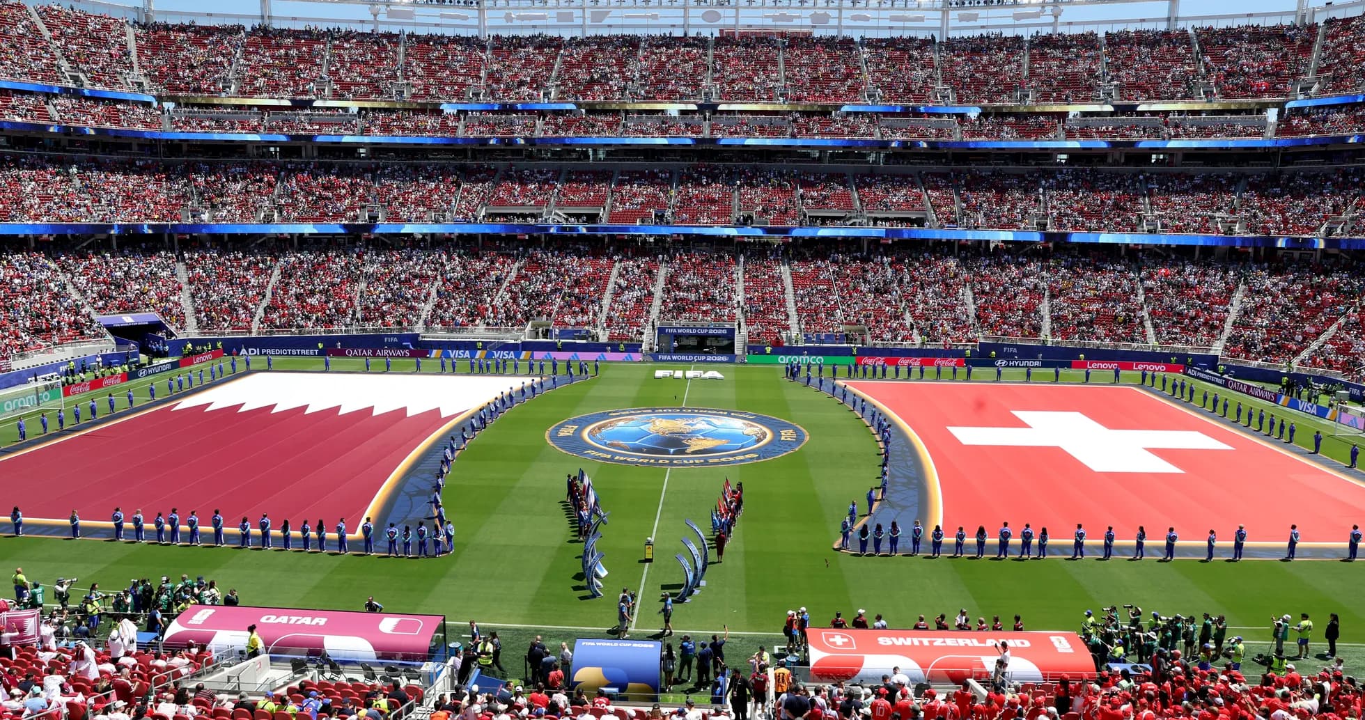 Qatar and Switzerland flags at World Cup match Qatar and Switzerland flags at World Cup match