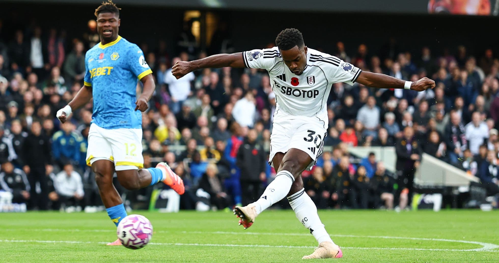 Fulham player shooting during Wolves match Fulham player shooting during Wolves match