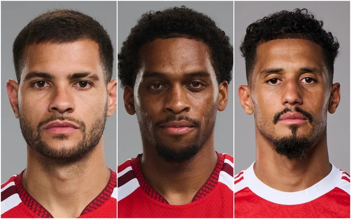 Three soccer players posing for headshots in jerseys Three soccer players posing for headshots in jerseys