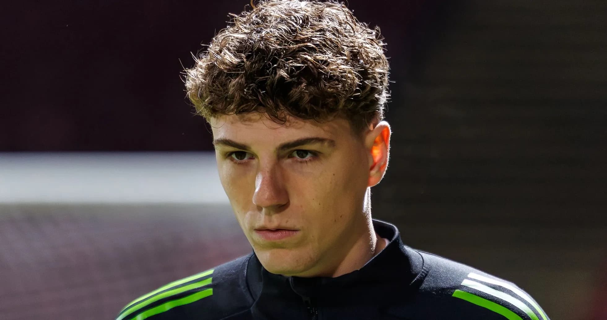 Player in training gear focused before match Player in training gear focused before match