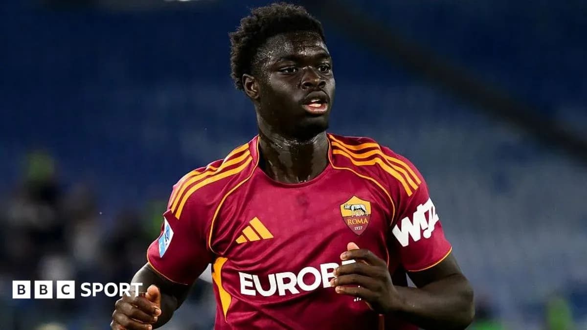 Player running in AS Roma home kit during match Player running in AS Roma home kit during match