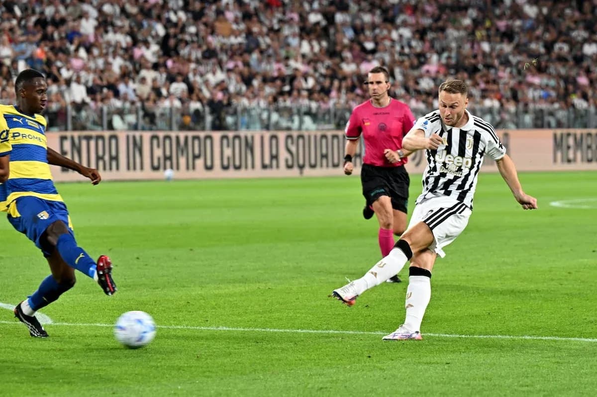 Juventus player shooting during Serie A match Juventus player shooting during Serie A match