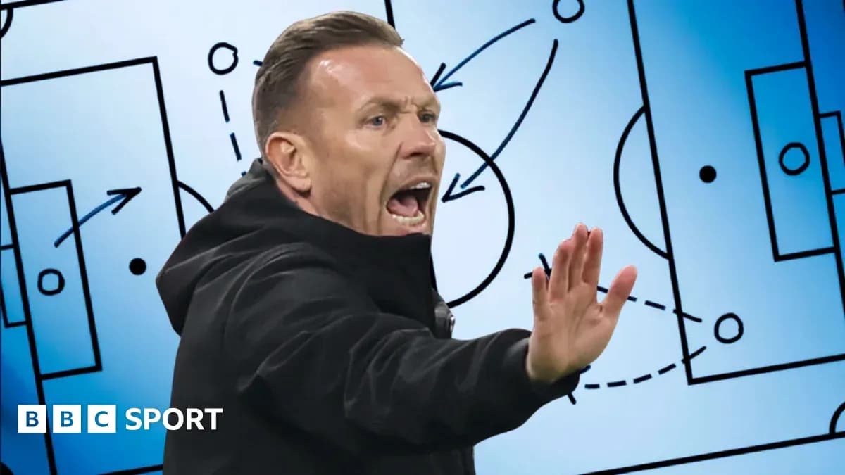 Coach gesturing during tactical discussion with diagram Coach gesturing during tactical discussion with diagram
