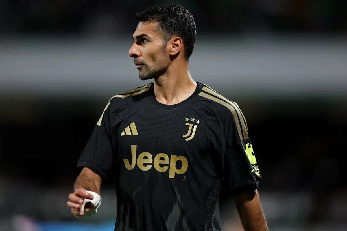 Goalkeeper in Juventus black kit during match Goalkeeper in Juventus black kit during match