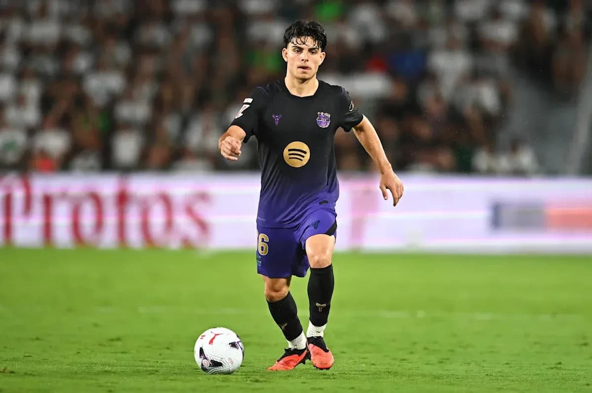 Player dribbling ball during match on field Player dribbling ball during match on field