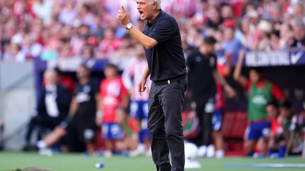 Manager directing players during a match Manager directing players during a match