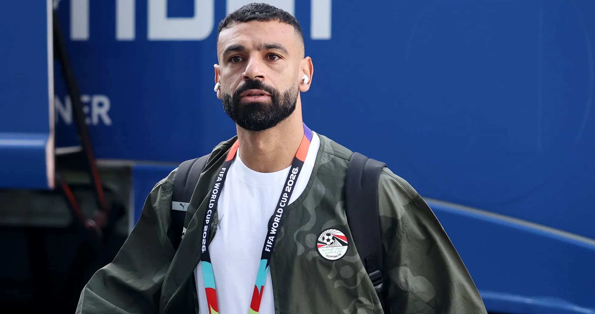 Player wearing headphones arriving at event venue Player wearing headphones arriving at event venue