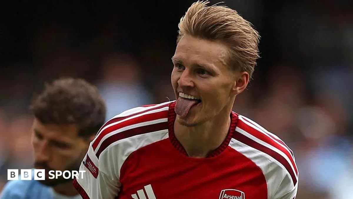 Arsenal player celebrating on the field Arsenal player celebrating on the field