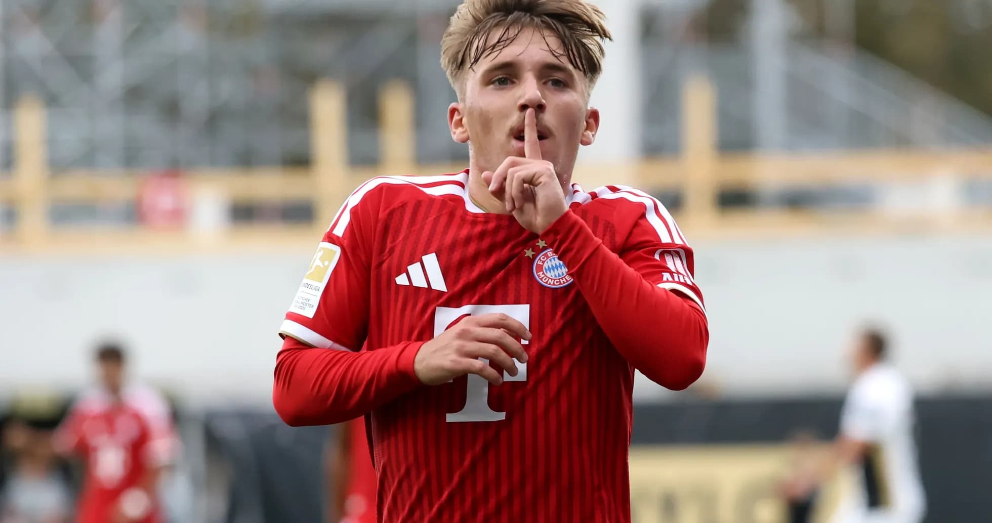 Player celebrating goal with finger on lips Player celebrating goal with finger on lips