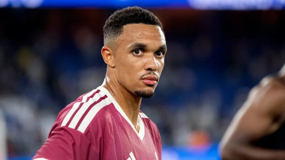 Player in maroon jersey looking at camera Player in maroon jersey looking at camera