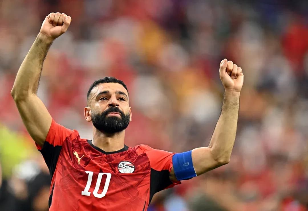 Player celebrating with raised arms in Egypt jersey Player celebrating with raised arms in Egypt jersey