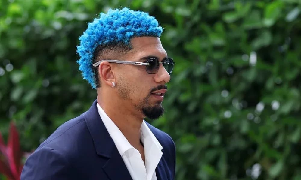 Man with blue hair wearing sunglasses and suit Man with blue hair wearing sunglasses and suit